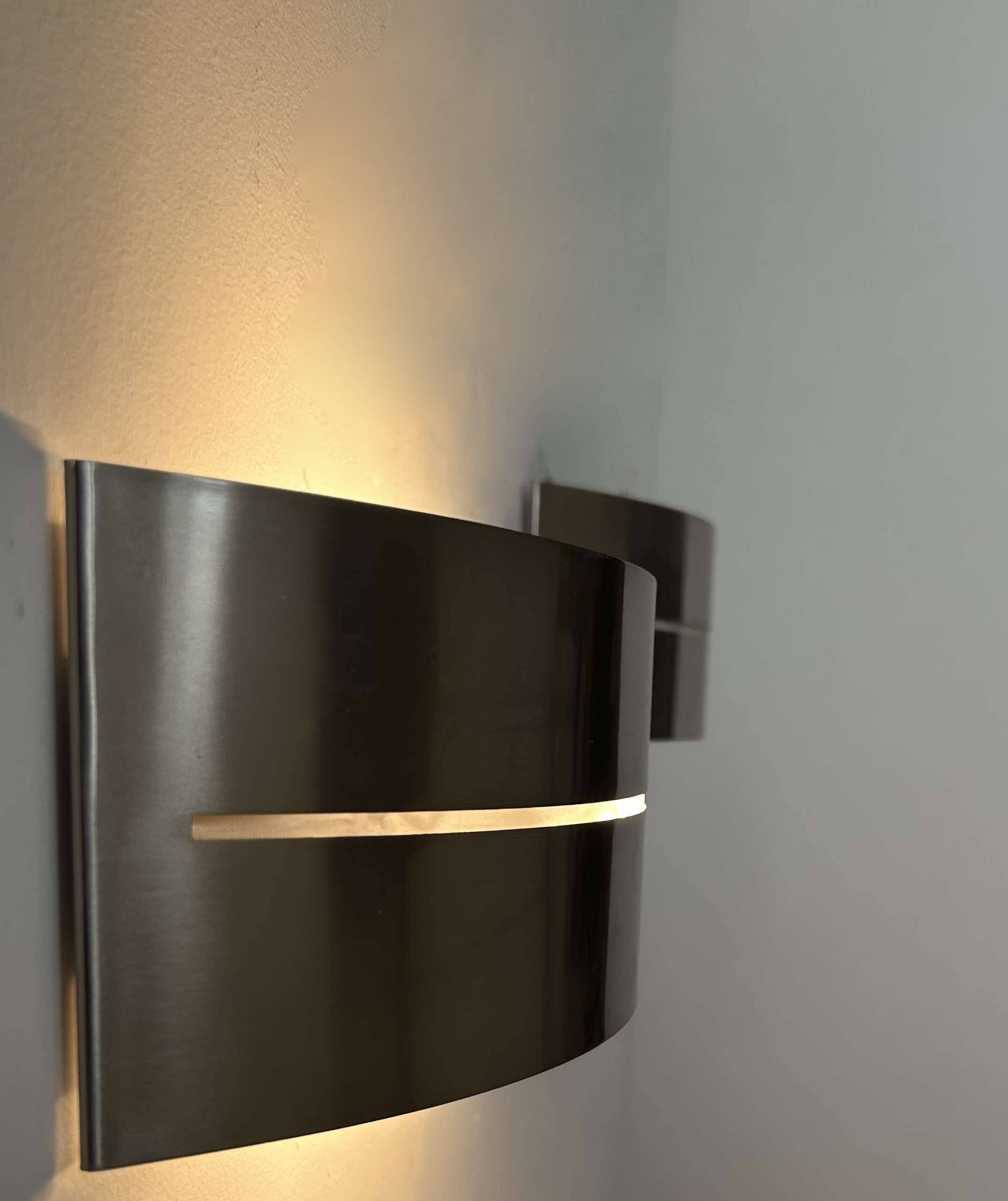 Pair of vintage wall lights, brushed metal, France 1980.