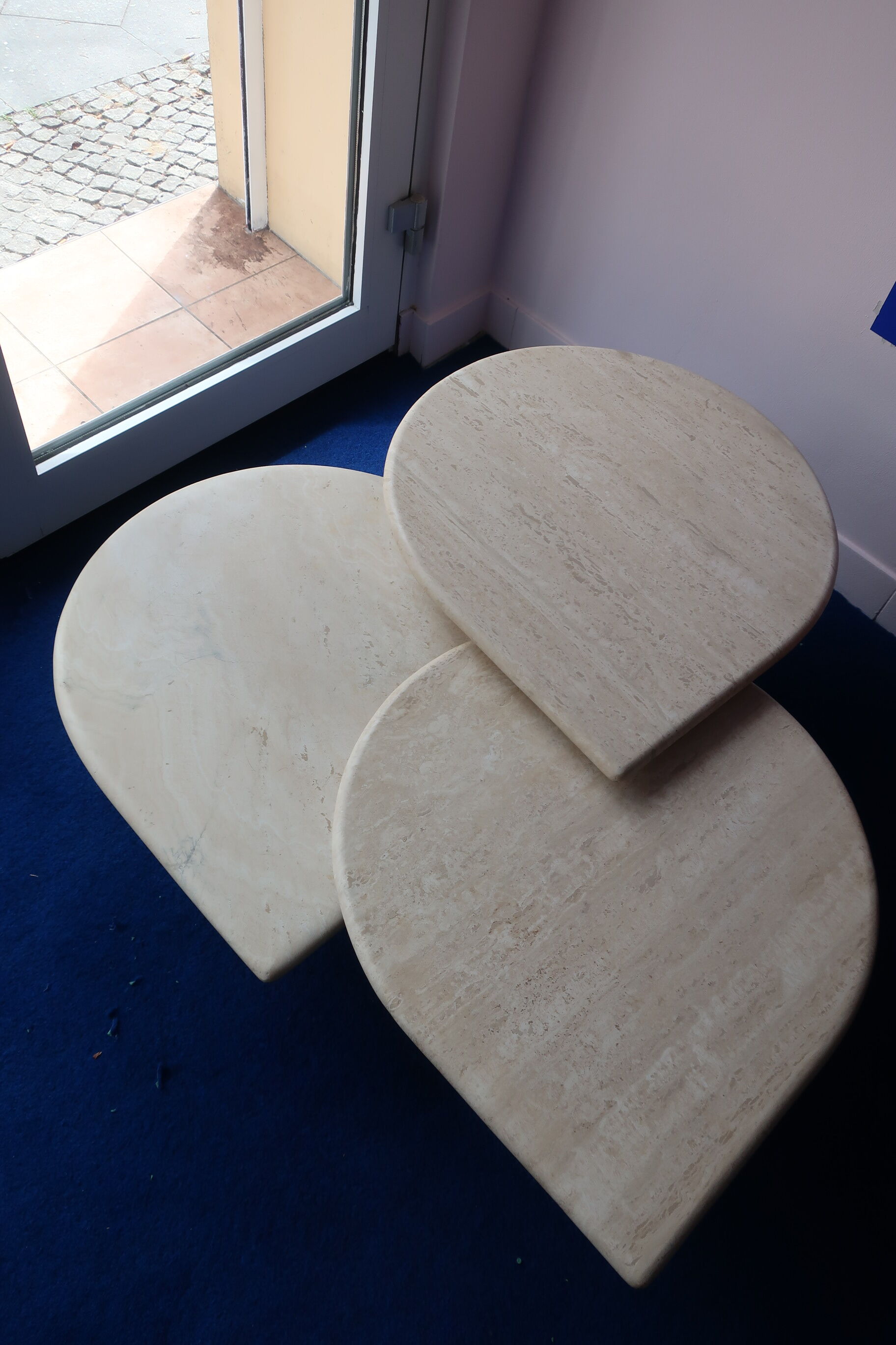Vintage tables of the 80s in travertine
