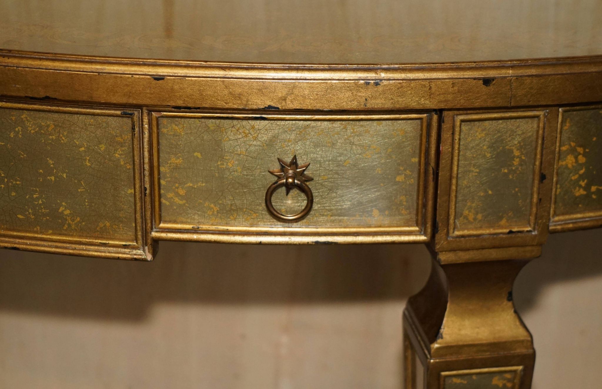 Half-moon console Eglomise Theodore Alexander with a gold finish.