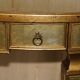 Console demi-lune Eglomise Theodore Alexander finition dorée