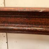 Pair of Louis XIV style fireplaces in red cherry marble. XIX century.