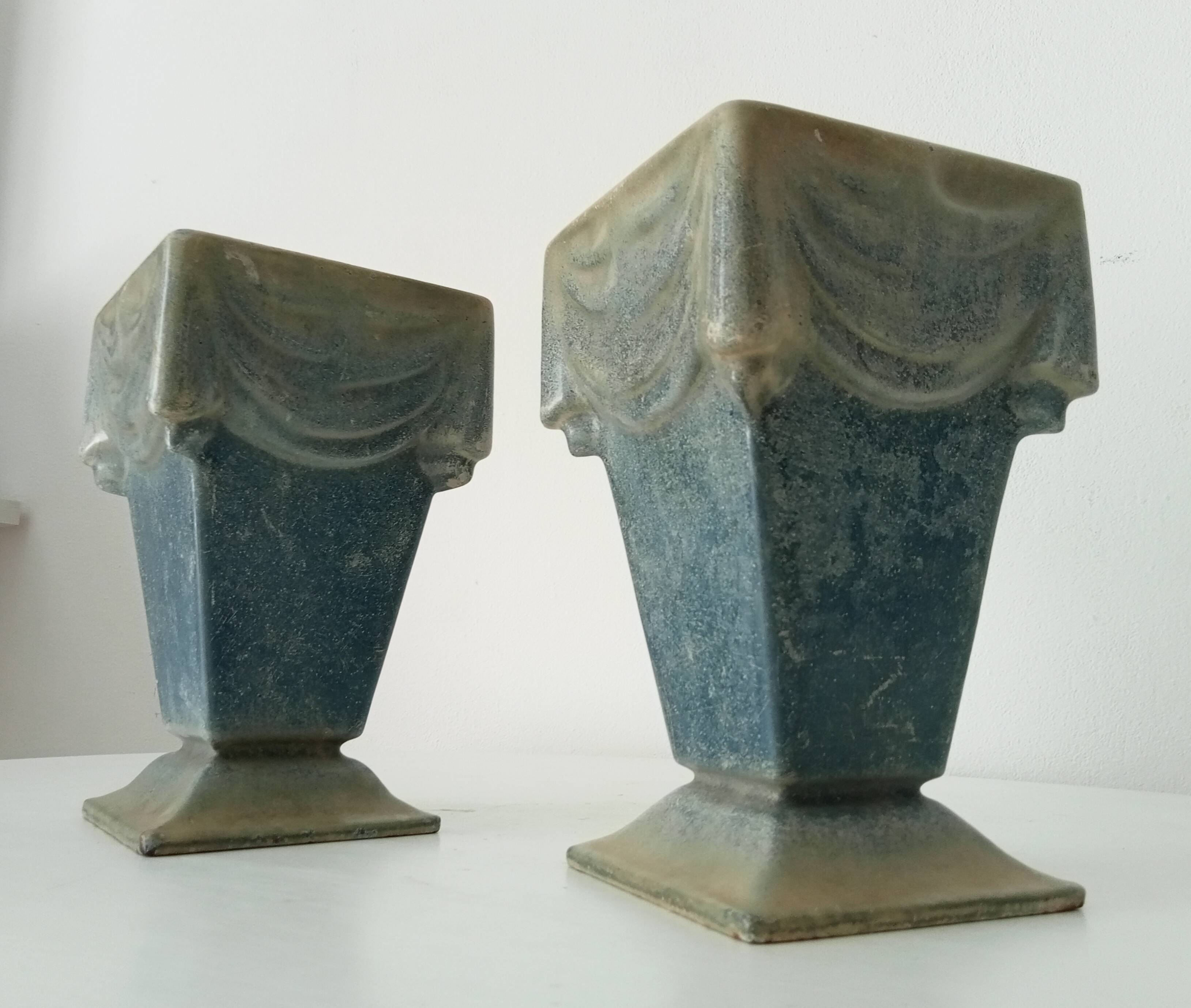 Pair of old art deco vases in enameled cast iron