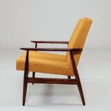 Vintage amber armchair Hermes designed by H. Lis