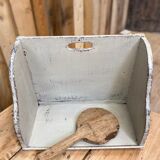 Old patinated washerwoman tray and its beater