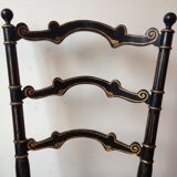 Paire de chaises noir et or
