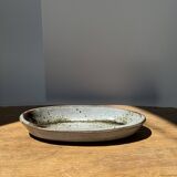 Petit plat ovale en céramique mouchetée glacée L23