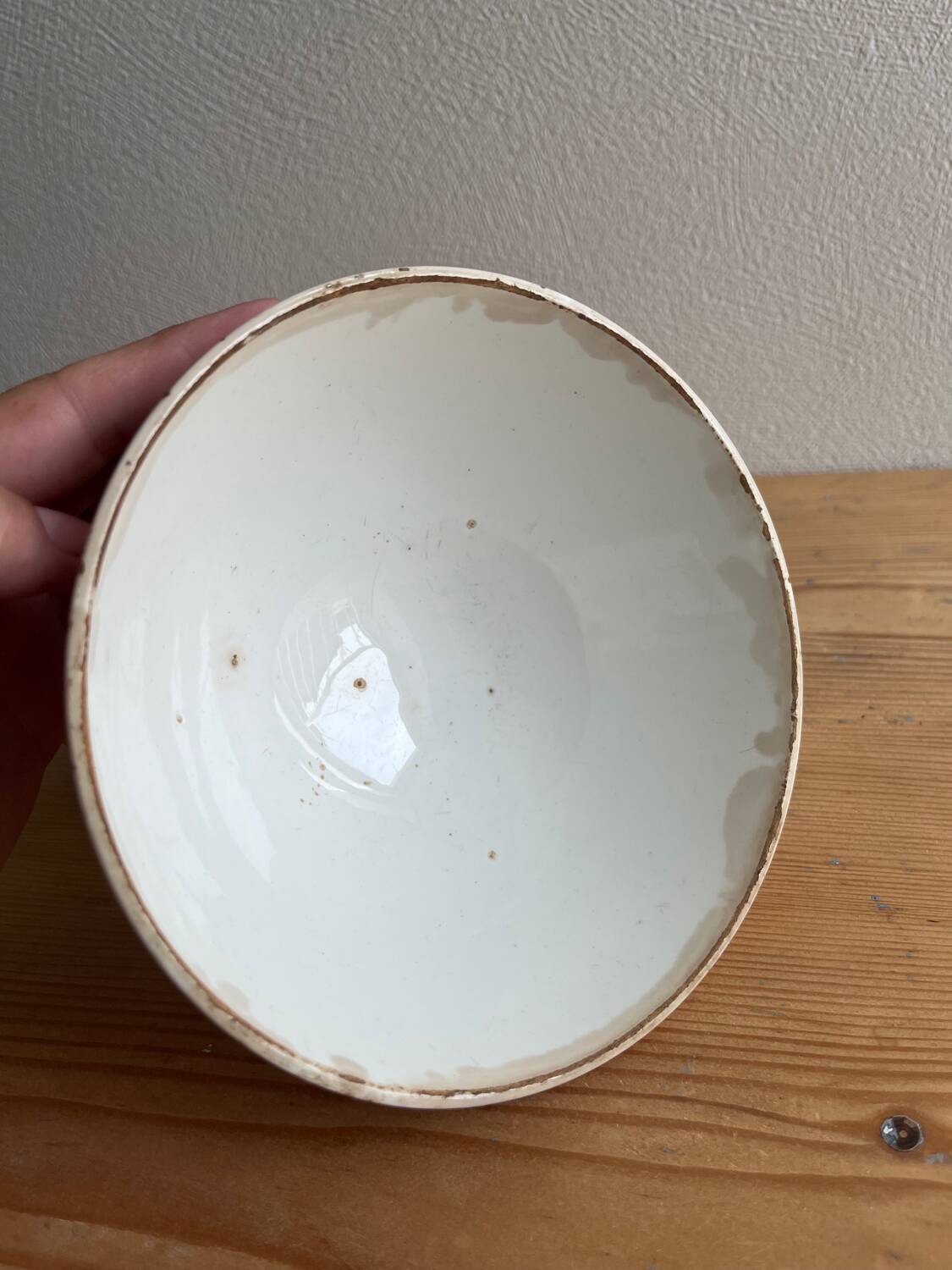 Old earthenware bowl on a pedestal, Badonviller, France.
