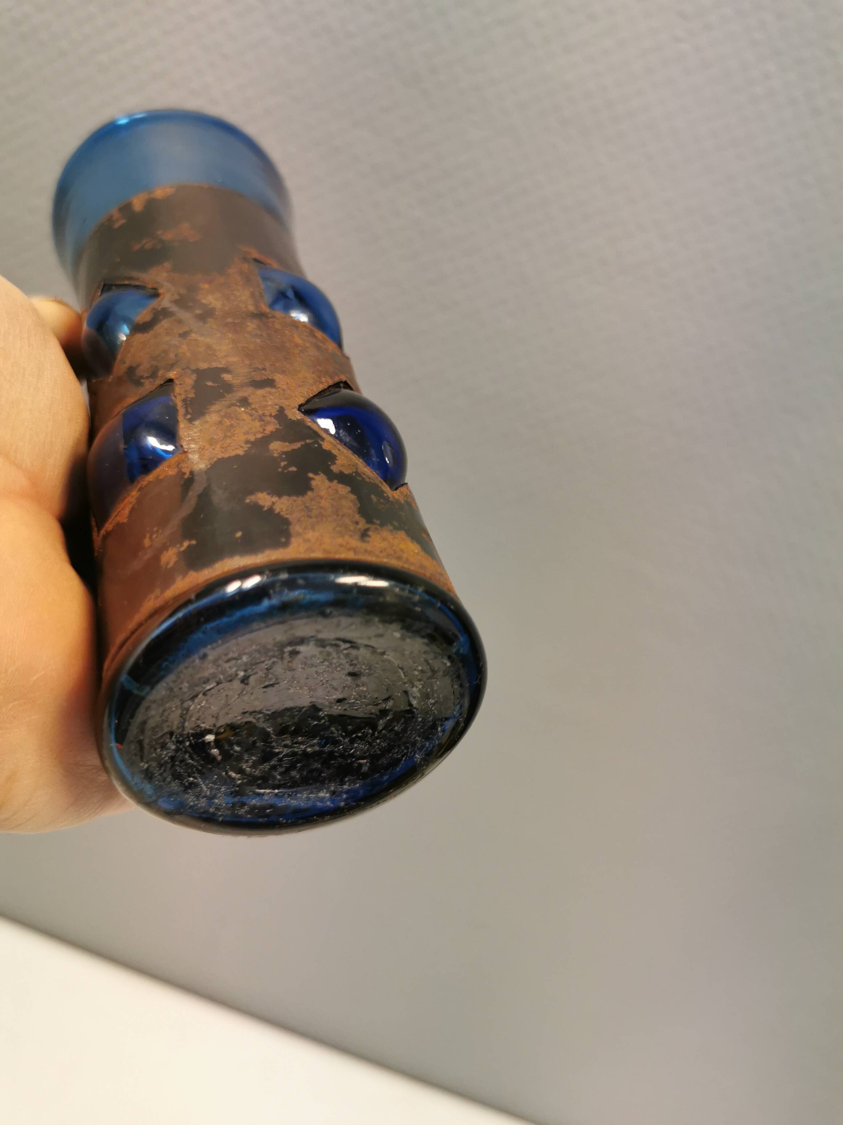 Brutalist style vase with inner blue glass mouth-blown out through the metal "frame".