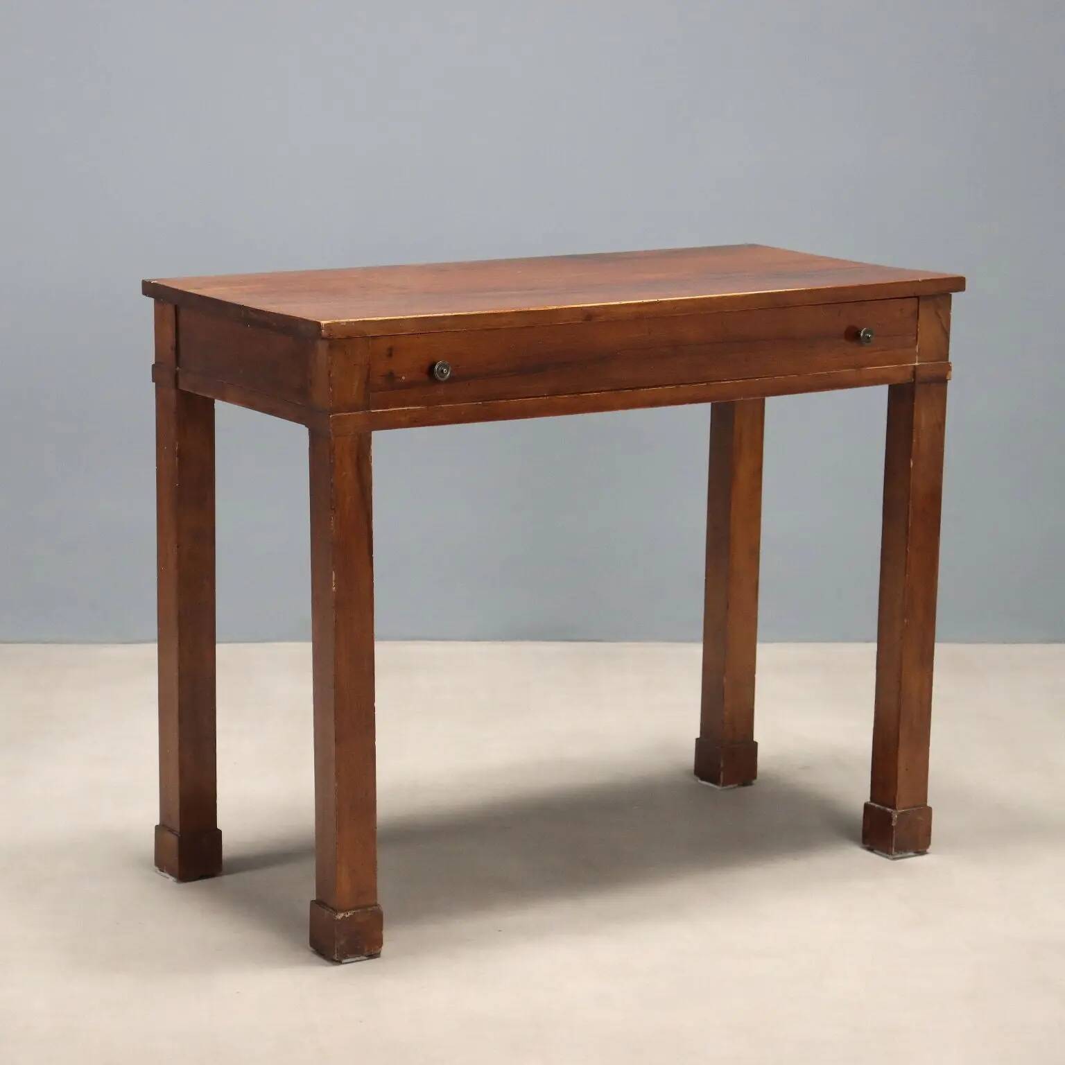 Ancient walnut console empire with drawer, Italy, 19th century.