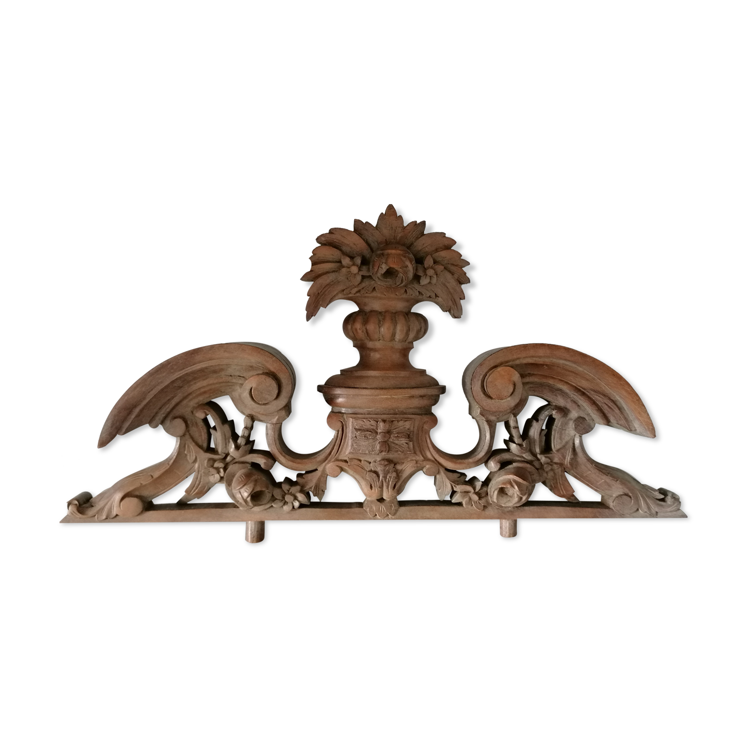 Old carved wooden pediment