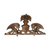 Old carved wooden pediment