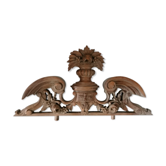 Old carved wooden pediment