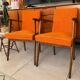 Pair of vintage 60s armchairs in wood and orange bouclé fabric