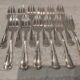 12 silver-plated metal cake forks by silversmith Guillaumot, contours