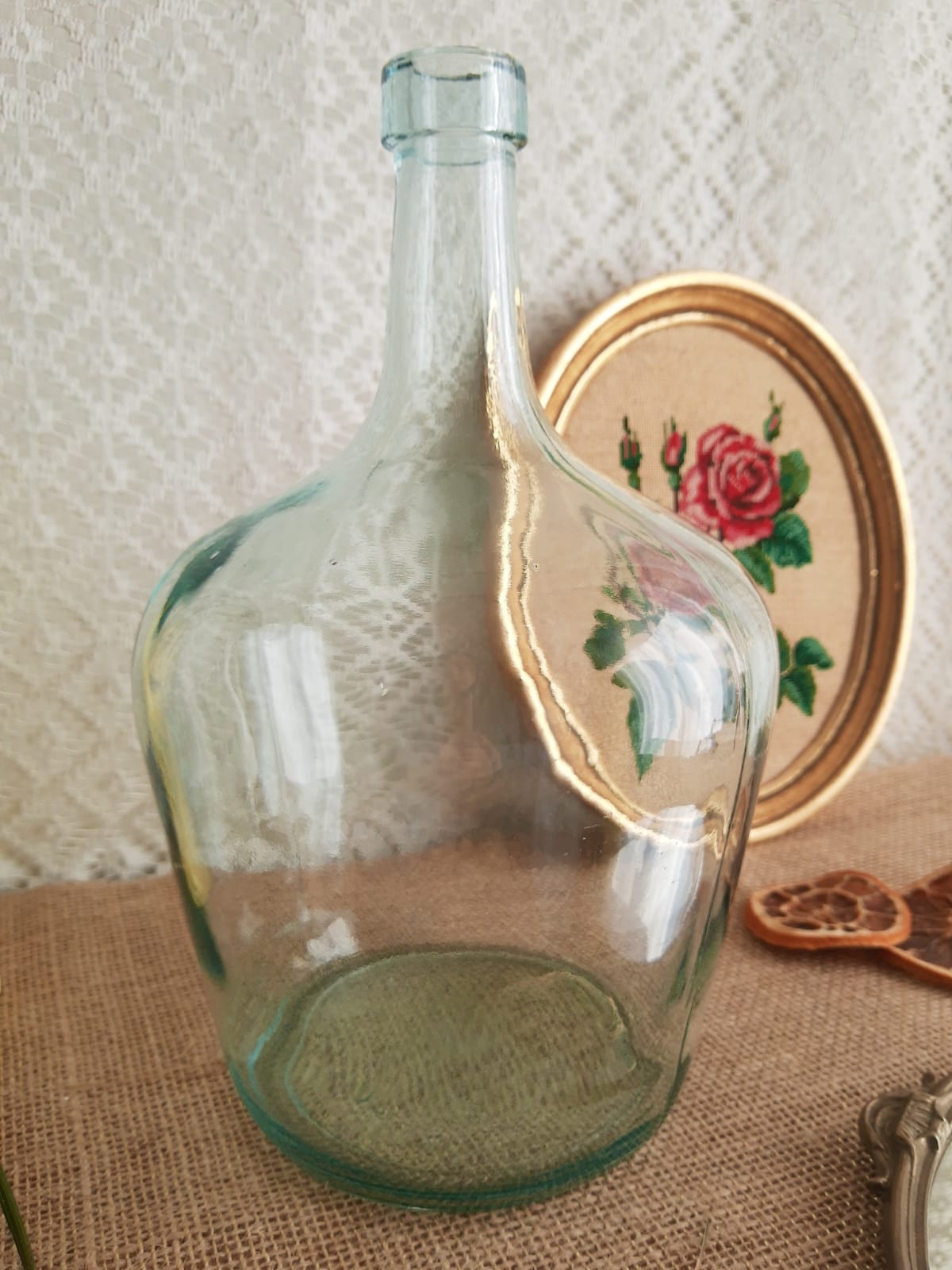 Demijohn in vintage transparent glass