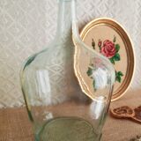 Demijohn in vintage transparent glass