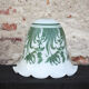 Opaline globe with green flower patterns, bell-shaped lampshade with a corolla.