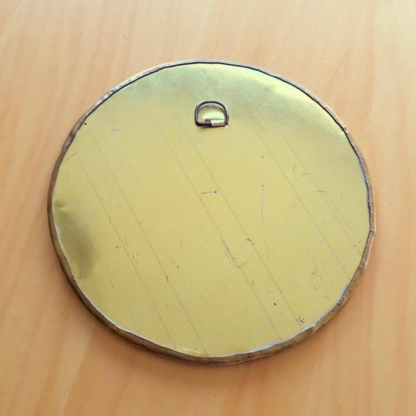 Round vintage brass mirror
