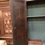 Armoire ancienne Louis XIII en noyer massif avec ses portes sculptées