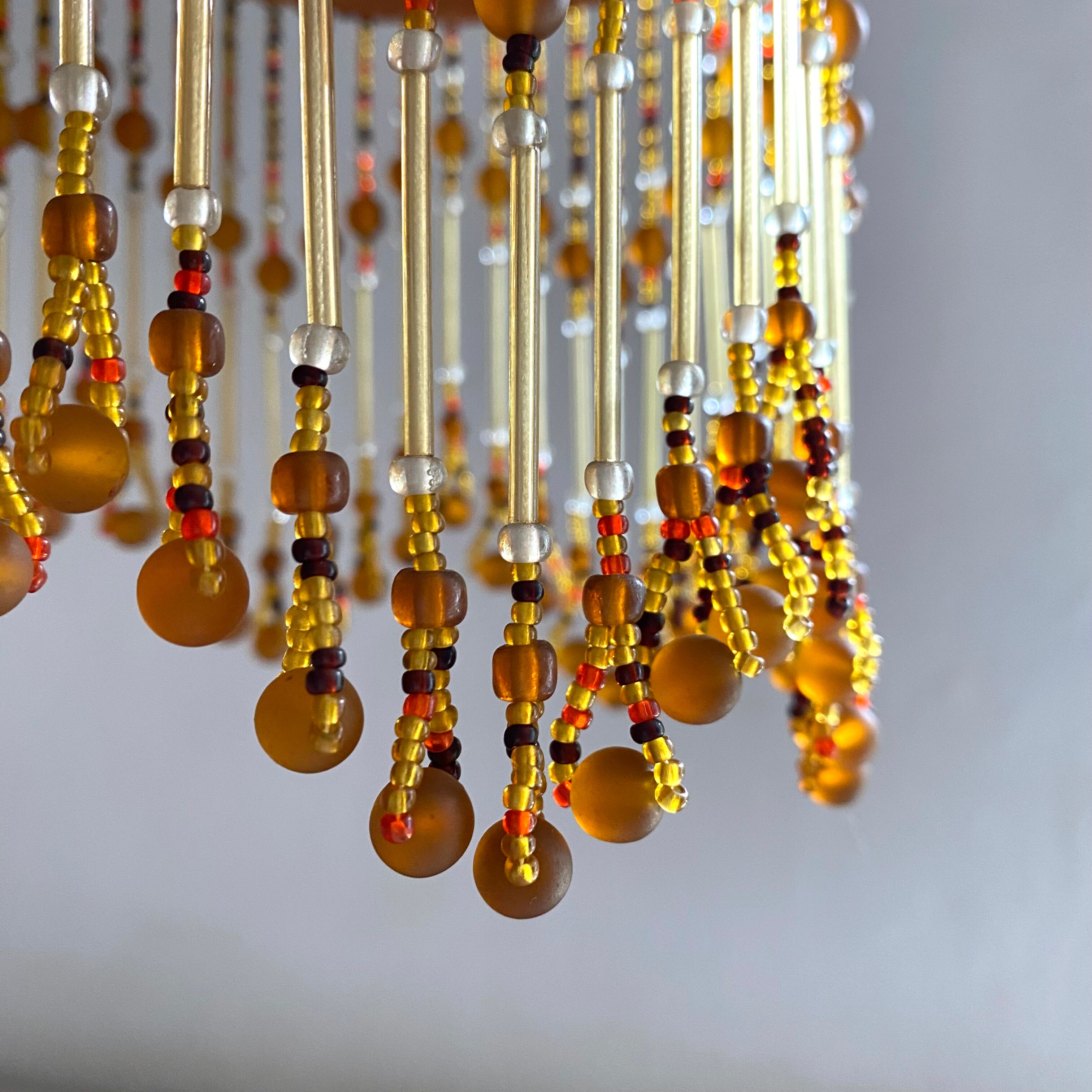 3-light chandelier in glass paste and pearl tassels
