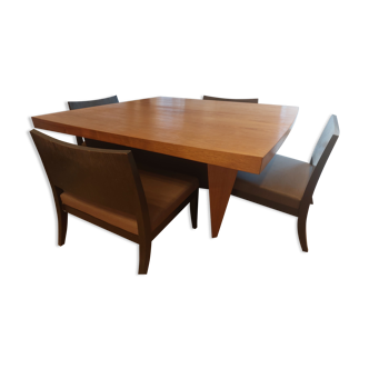 Wooden dining table and 4 design armchairs