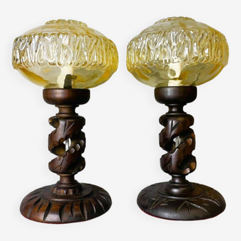 Pair African carved wood and amber glass table lamps