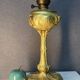 Beautiful and old oil lamp in gilded bronze, attributed to Georges Leleu