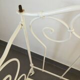 White wrought iron folding bed