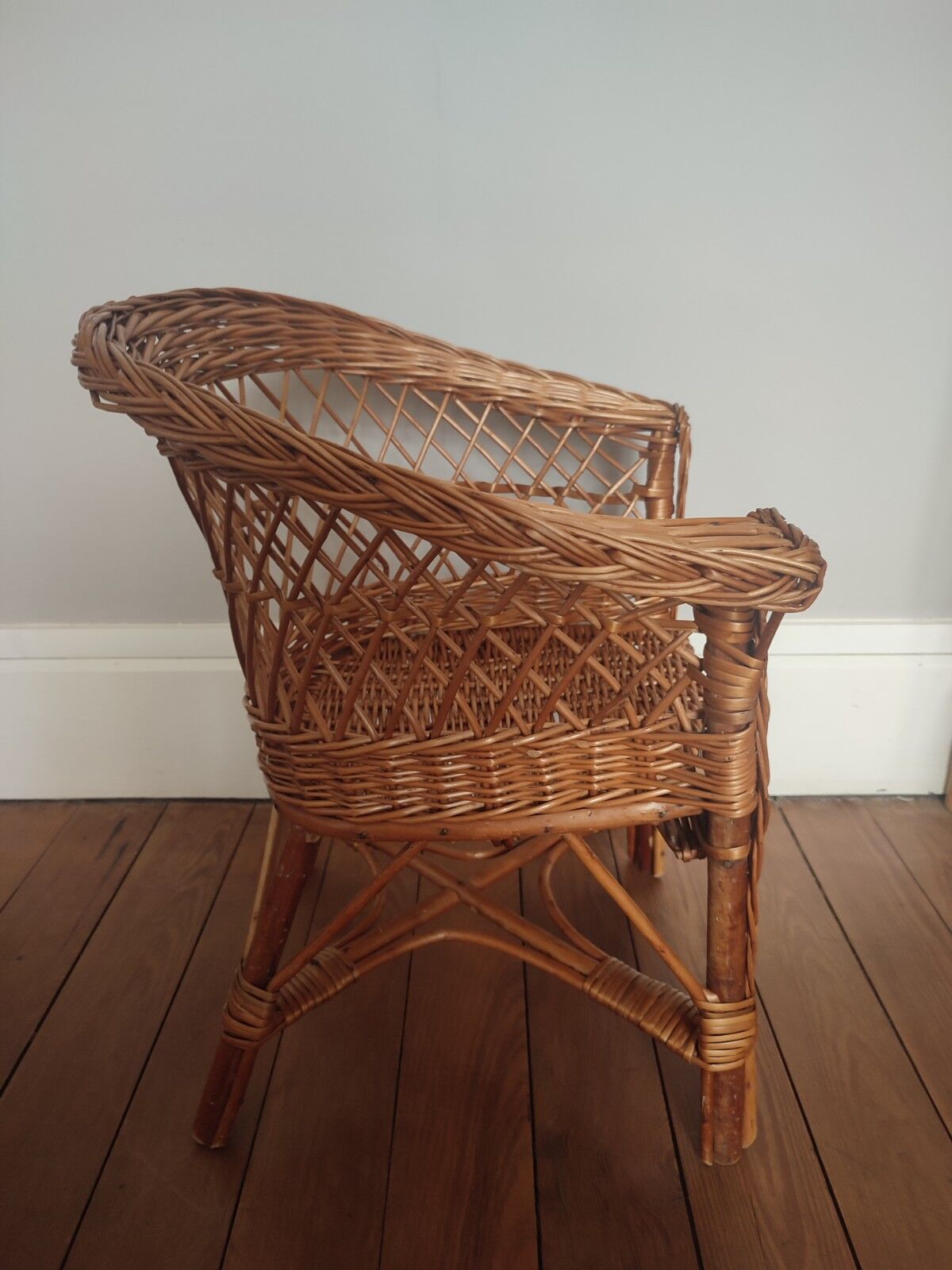 Vintage wicker children's armchair