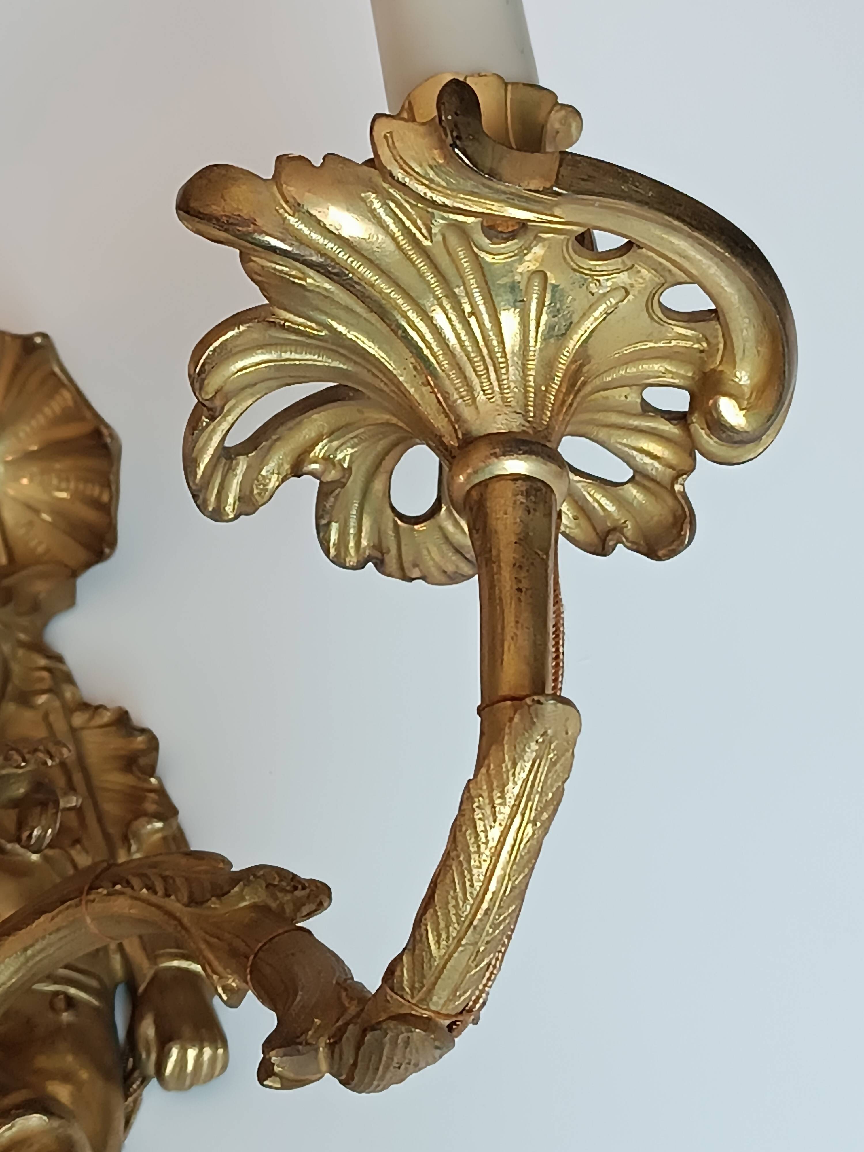 Pair of Regency style gilt bronze wall lights