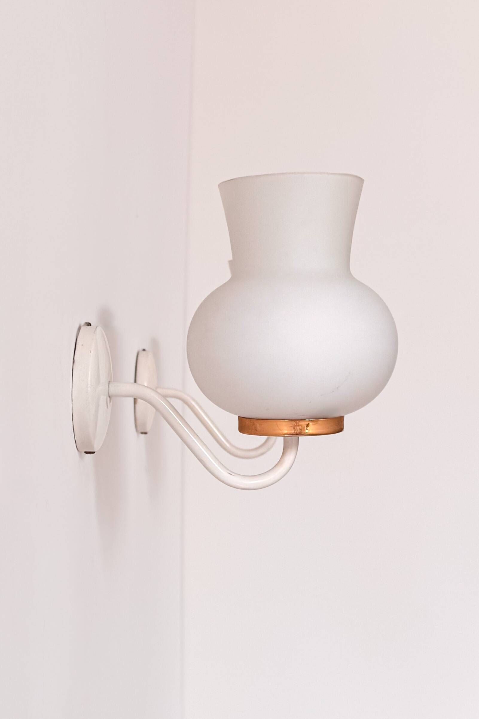 Pair of vintage wall lights in brass and opaline, France 1970.