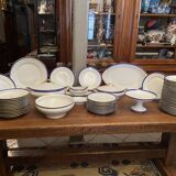 Limoges porcelain table service with blue band on white and gold background