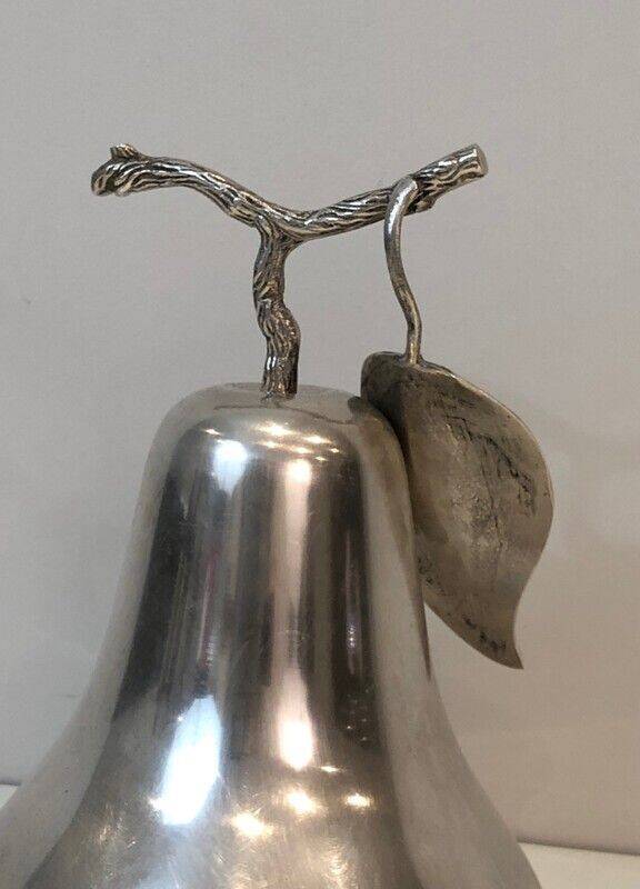 Silver-plated metal and plastic pear-shaped ice bucket.