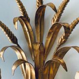 Double golden spike wall lamp