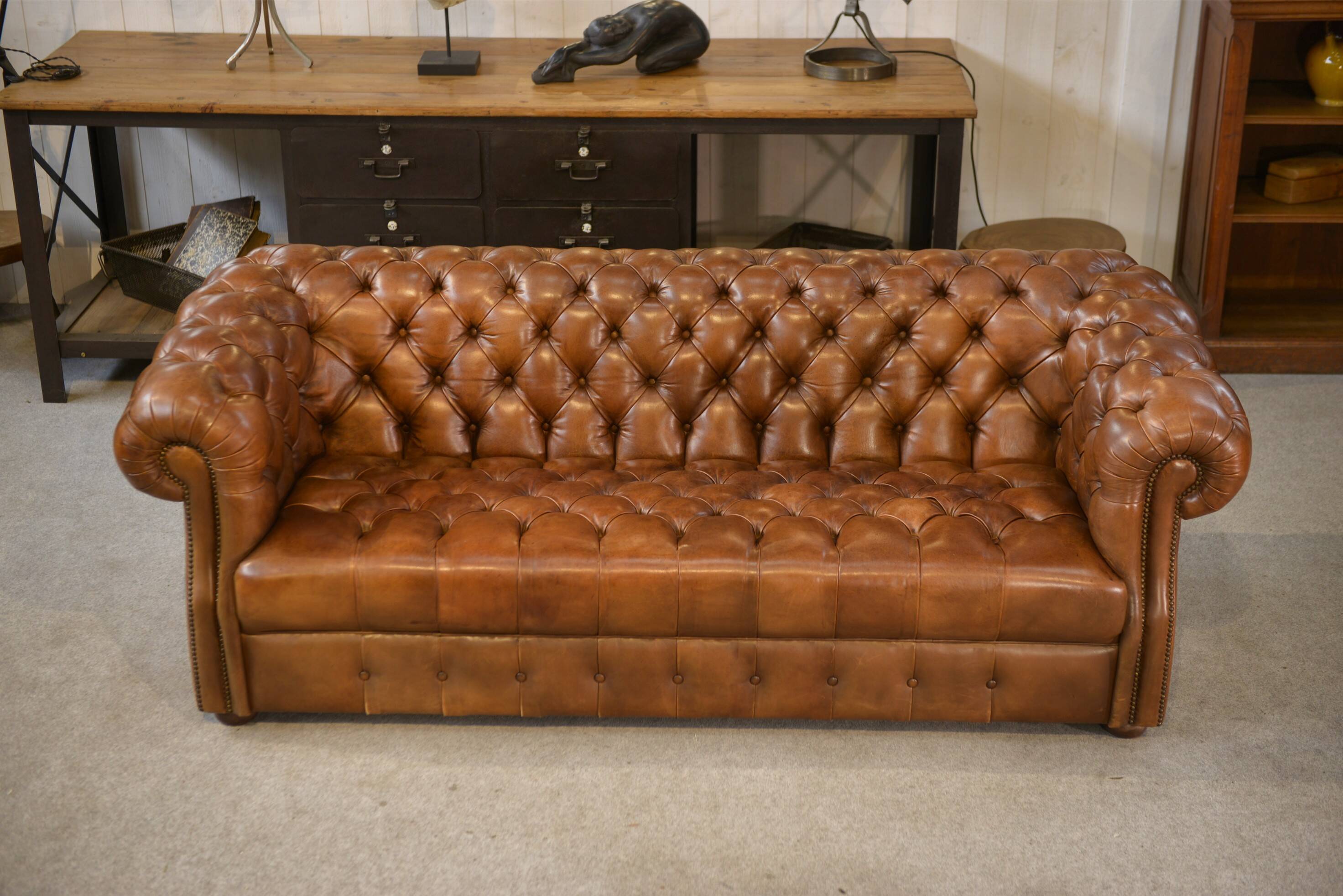 Tan leather tufted Chesterfield sofa