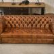 Tan leather tufted Chesterfield sofa