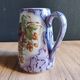 Vintage porcelain pitcher Lusseray France, decorated with grape clusters.