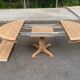 Large extendable round dining table stripped with a central wooden leg 110-198cm.