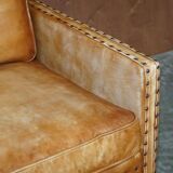 Two-seater leather canapé, hand-tanned, Edwardian style with studs.