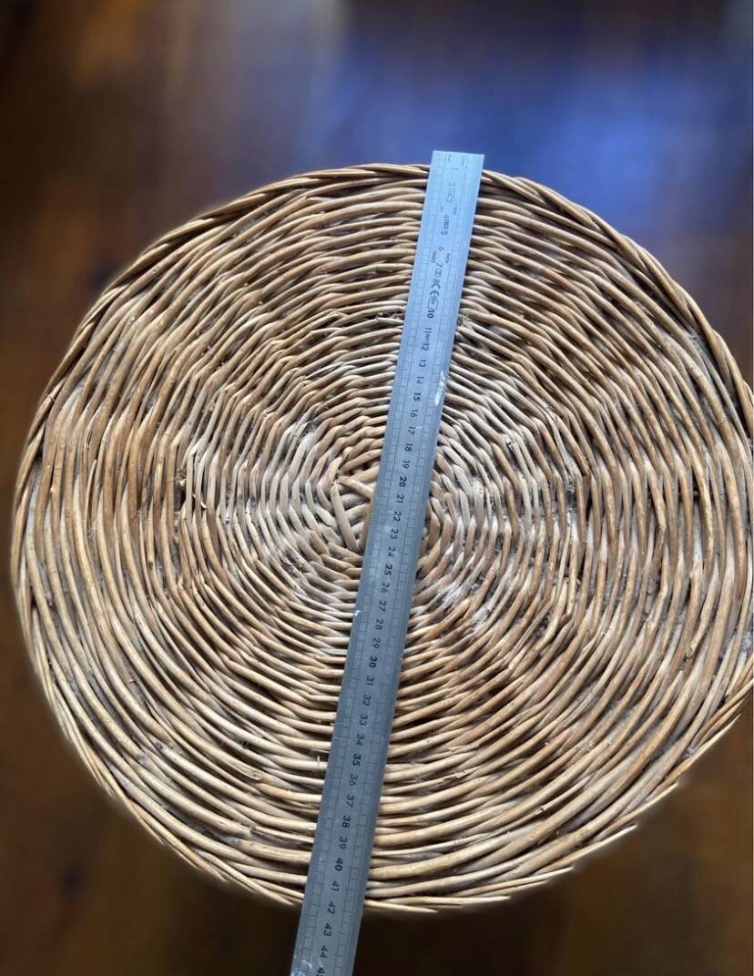 Vintage 1960s coffee table in woven wicker.