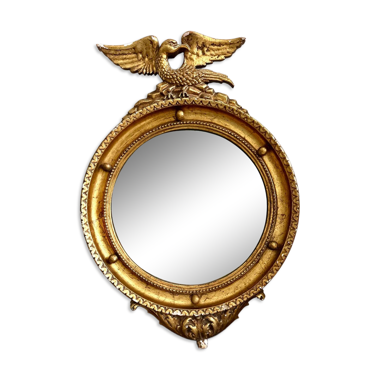 Antique gilded mirror decorated with an eagle