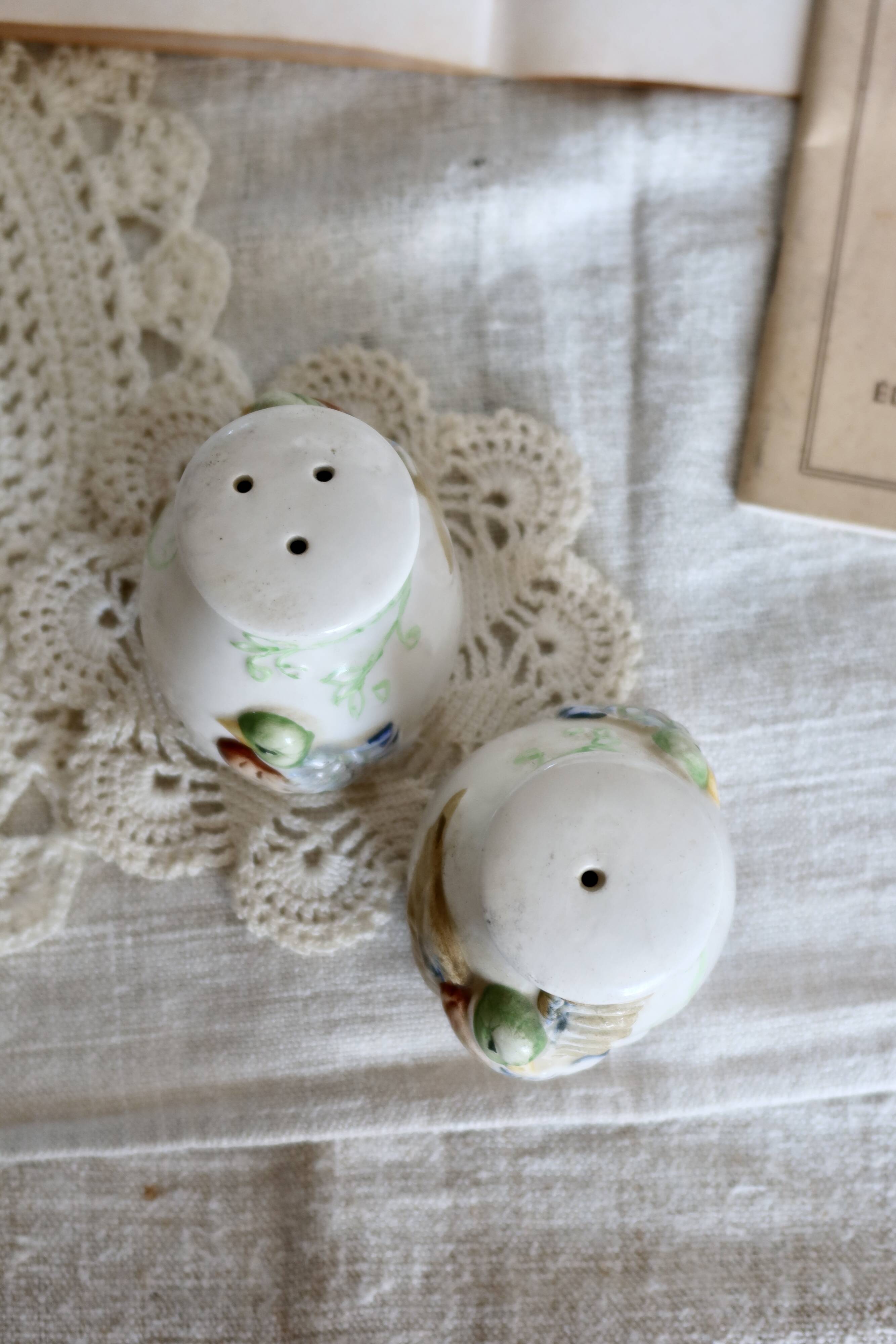 Vintage earthenware and slip salt and pepper shakers with duck motif