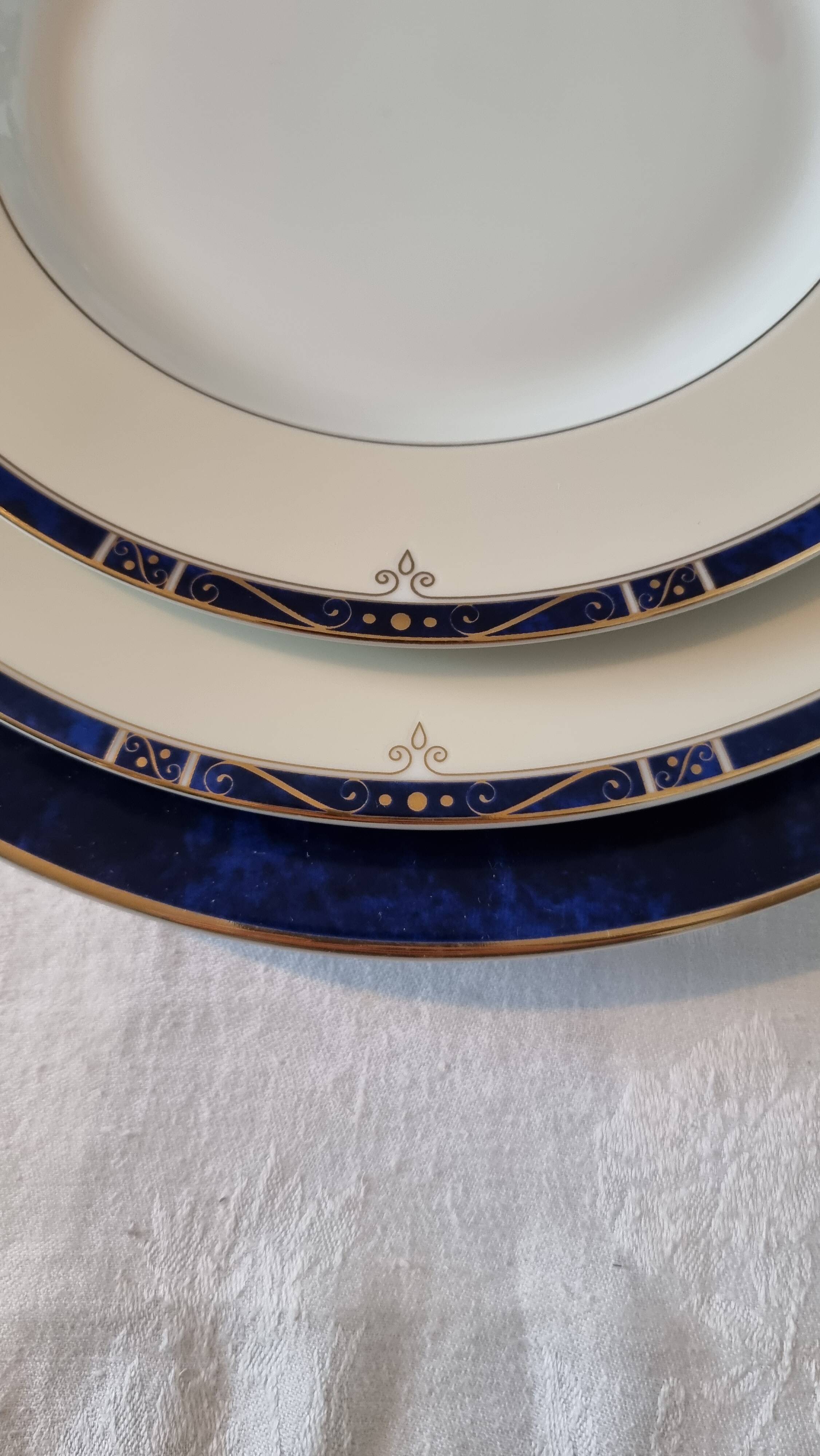 18-piece porcelain dinnerware set from Limoges by Philippe Deshoulières.
