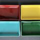 4 multicolored earthenware raviers