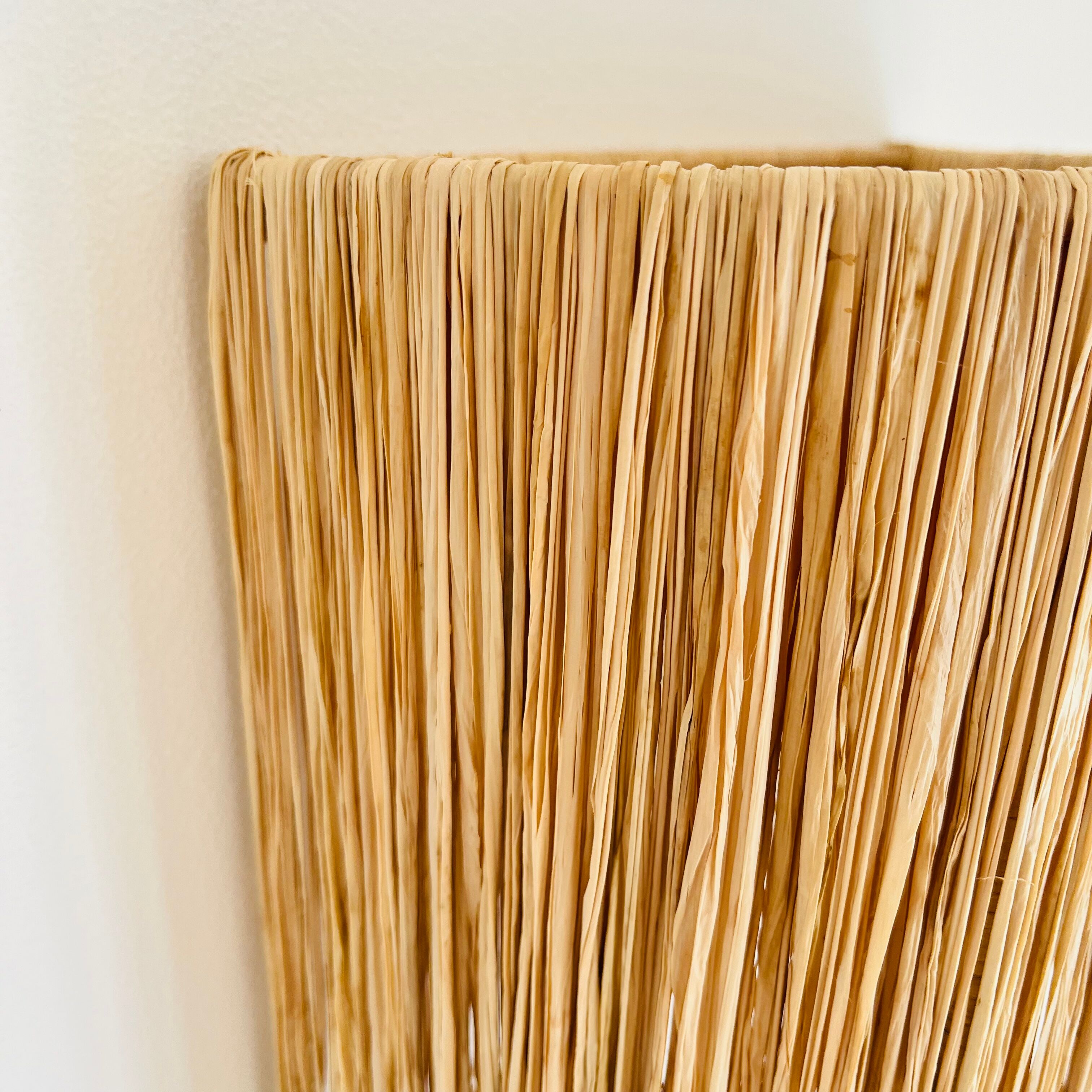 Raffia wall lamp