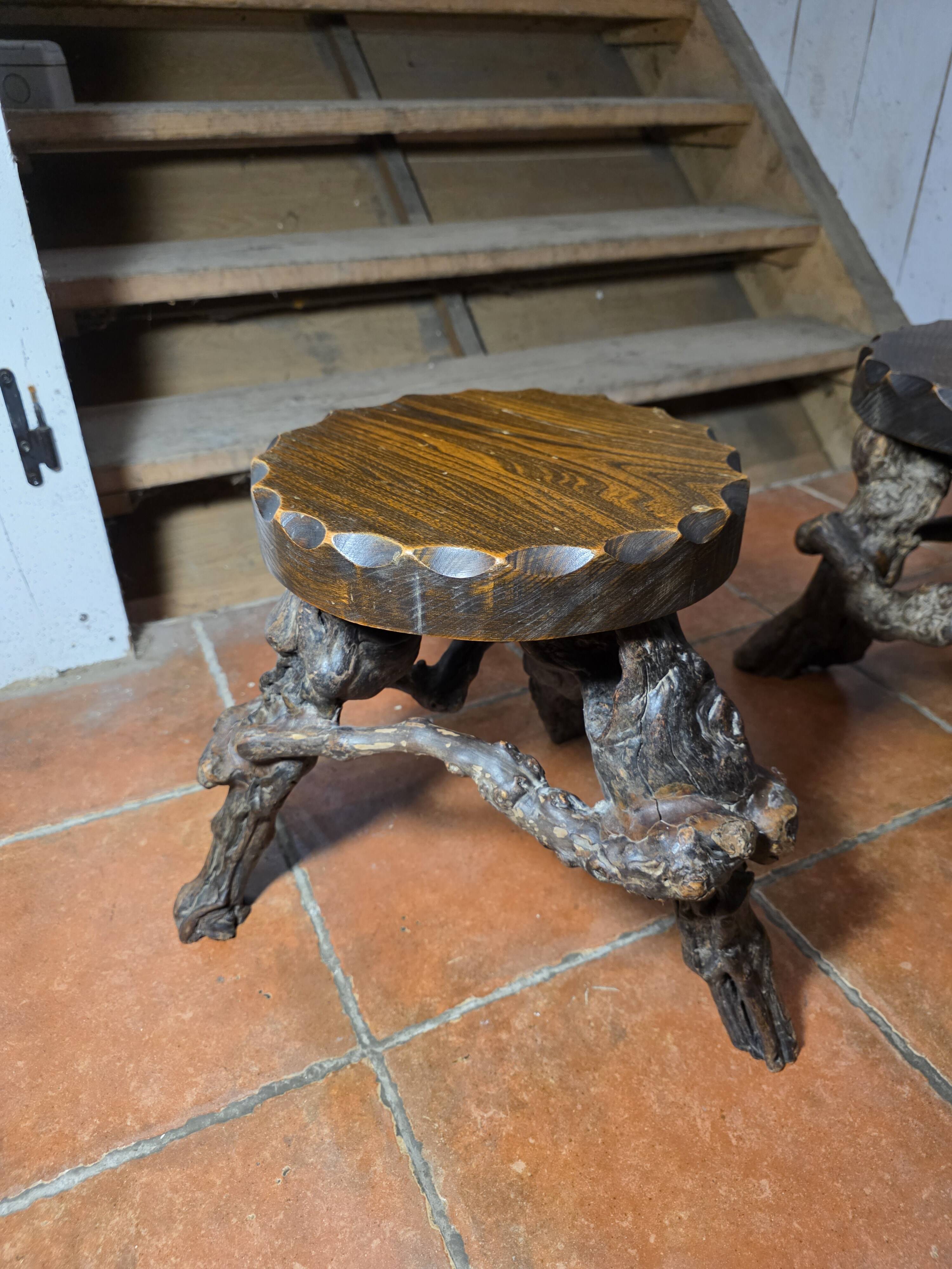 Pair of tripod stools with vine legs, oak top.