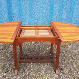 Stretchable garden dining table in solid teak