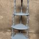 Antique corner shelf on legs