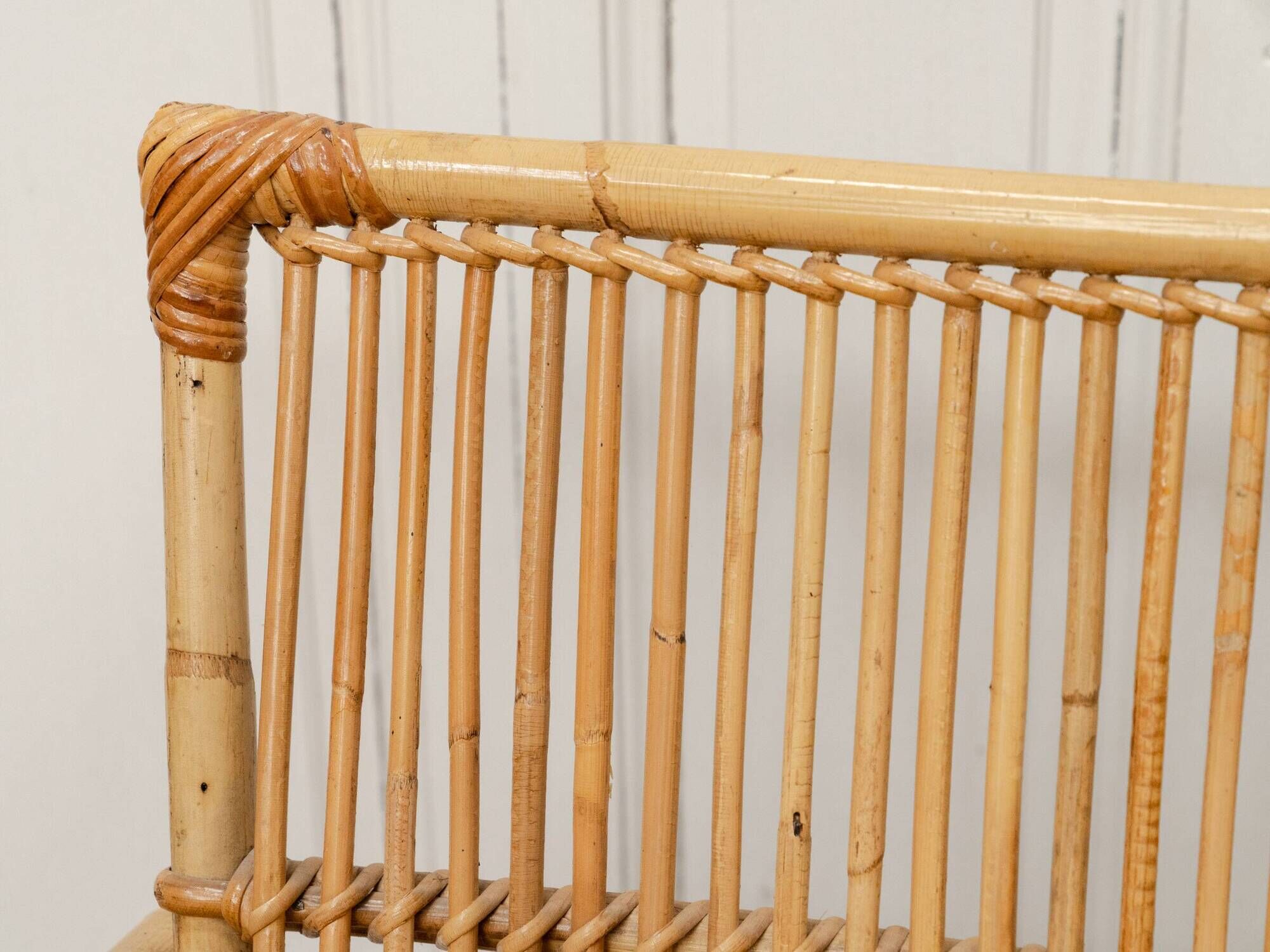 Vintage bamboo and rattan bench from the 1970s.