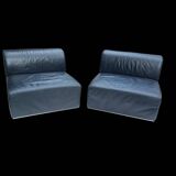 Pair of vintage black leather easy chairs